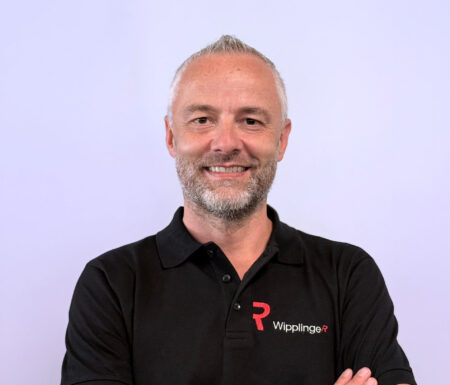 Portraitfoto eines Mannes mit schwarzem Wipplinger Polo