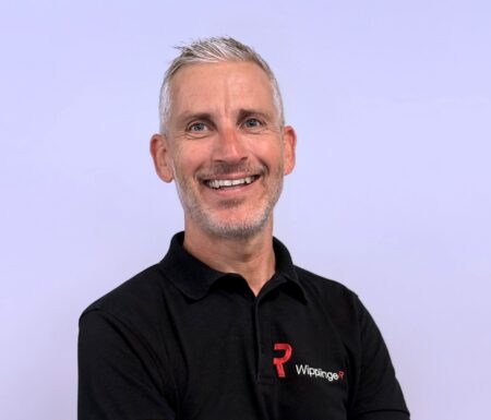 Portraitfoto eines Mannes mit schwarzem Wipplinger Polo